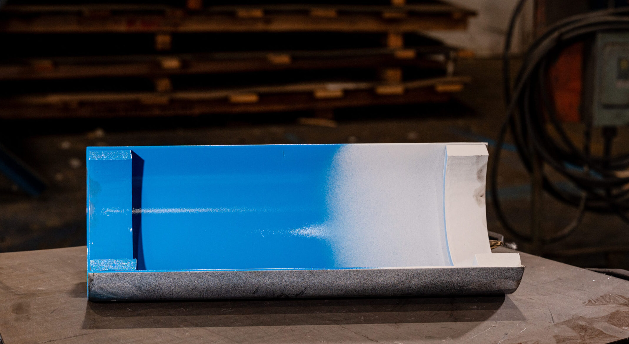 A Transcon conveyor pan section on the shop floor during fabrication