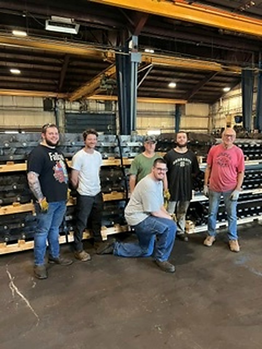 The Transcon fabrication team in front of the finished 367-foot steel belt in Mentor, Ohio