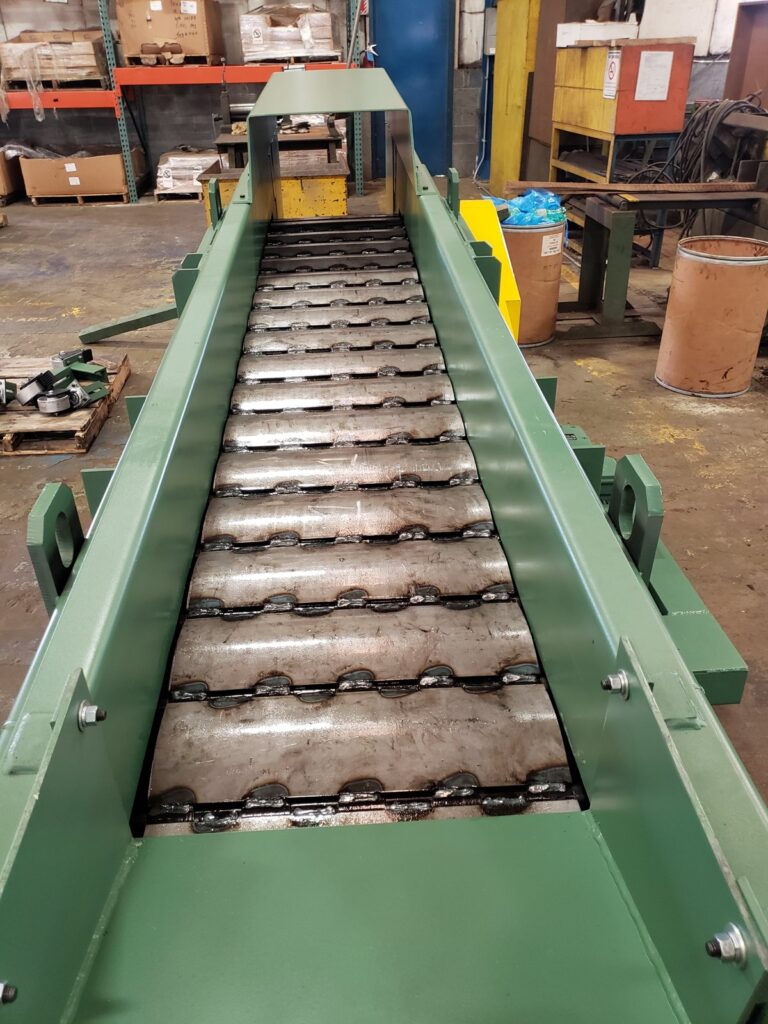 Transcon steel belt conveyor with welded pans and hinge loops
